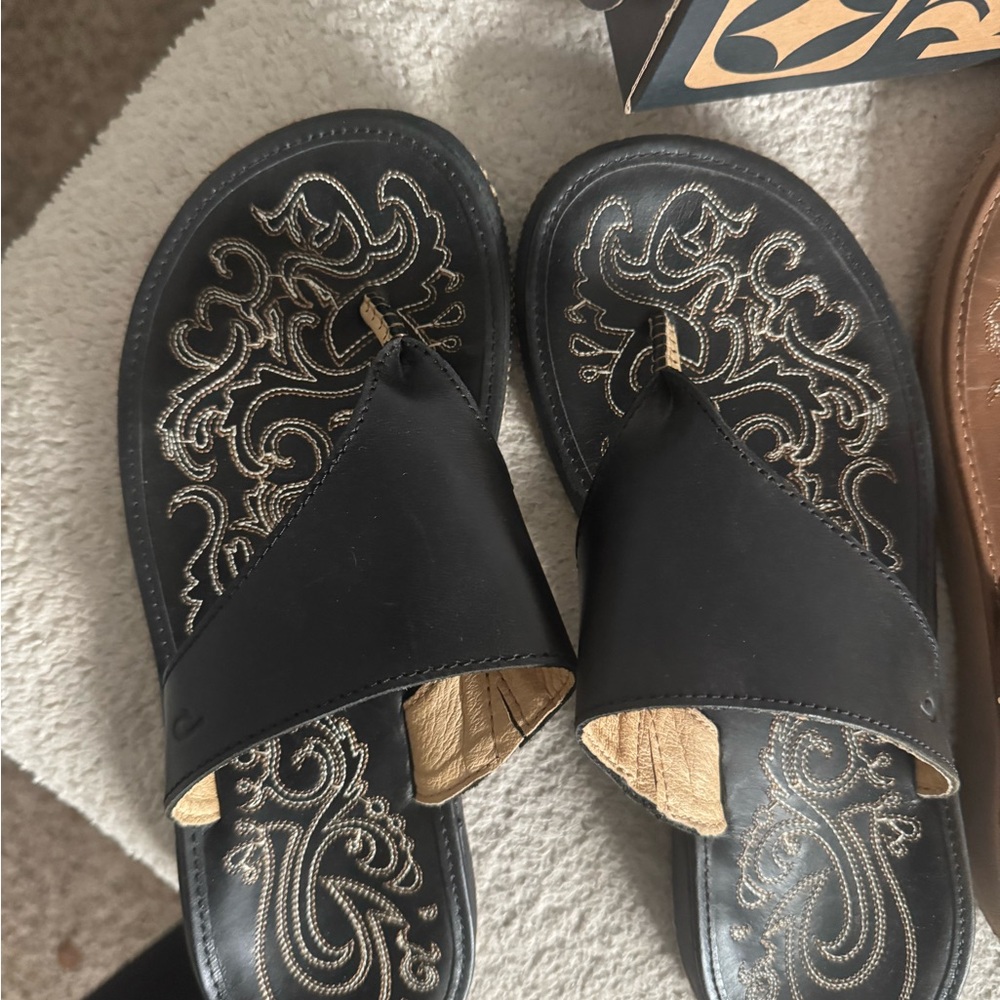 OLUKAI Women’s Black Slip-On Sandals with Embroidered Footbed